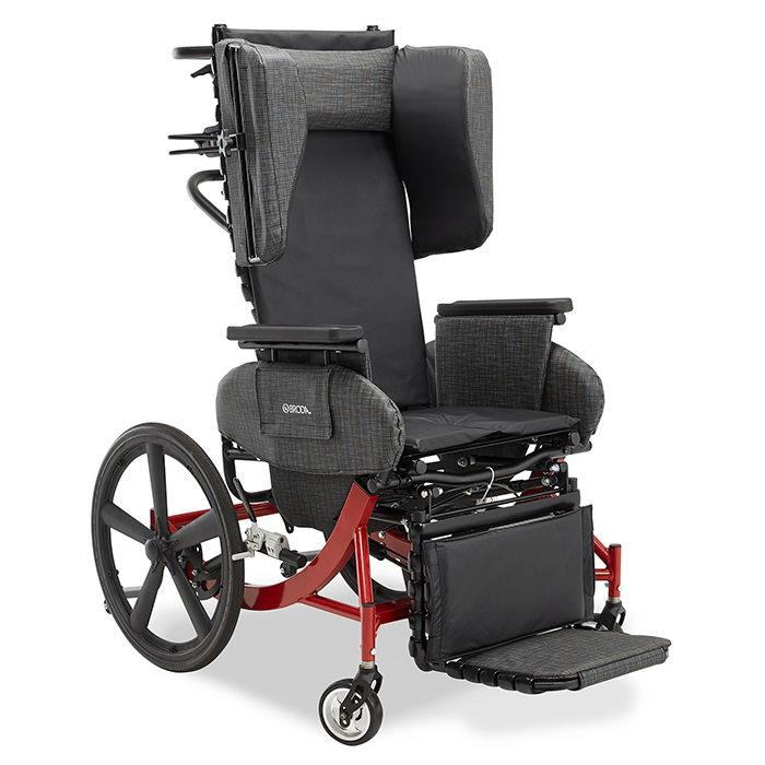 A wheelchair with a long back and head pads.