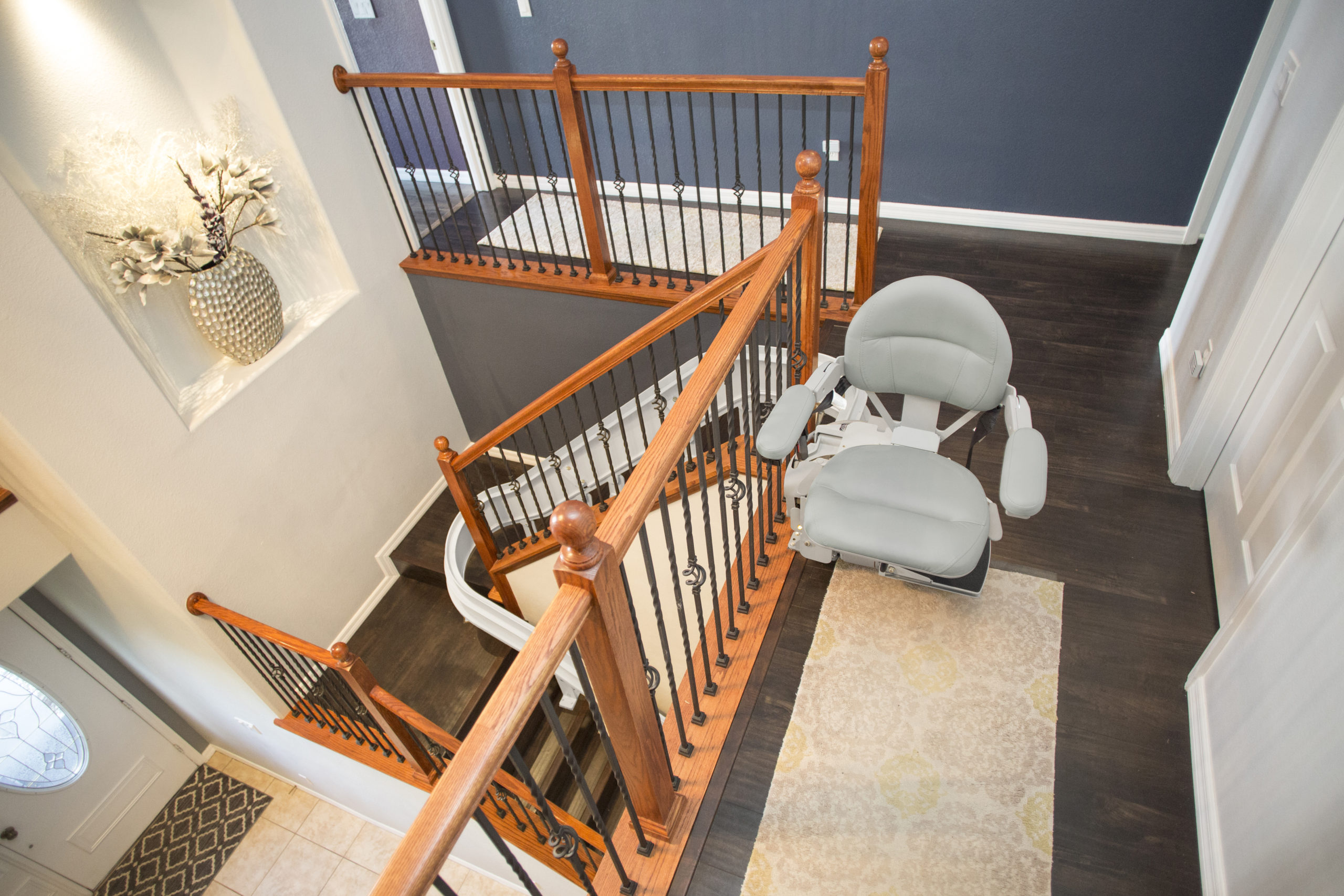 Home Medical Curved Stair Lifts top of staircase | Mission Health + Home in Rochester, NY