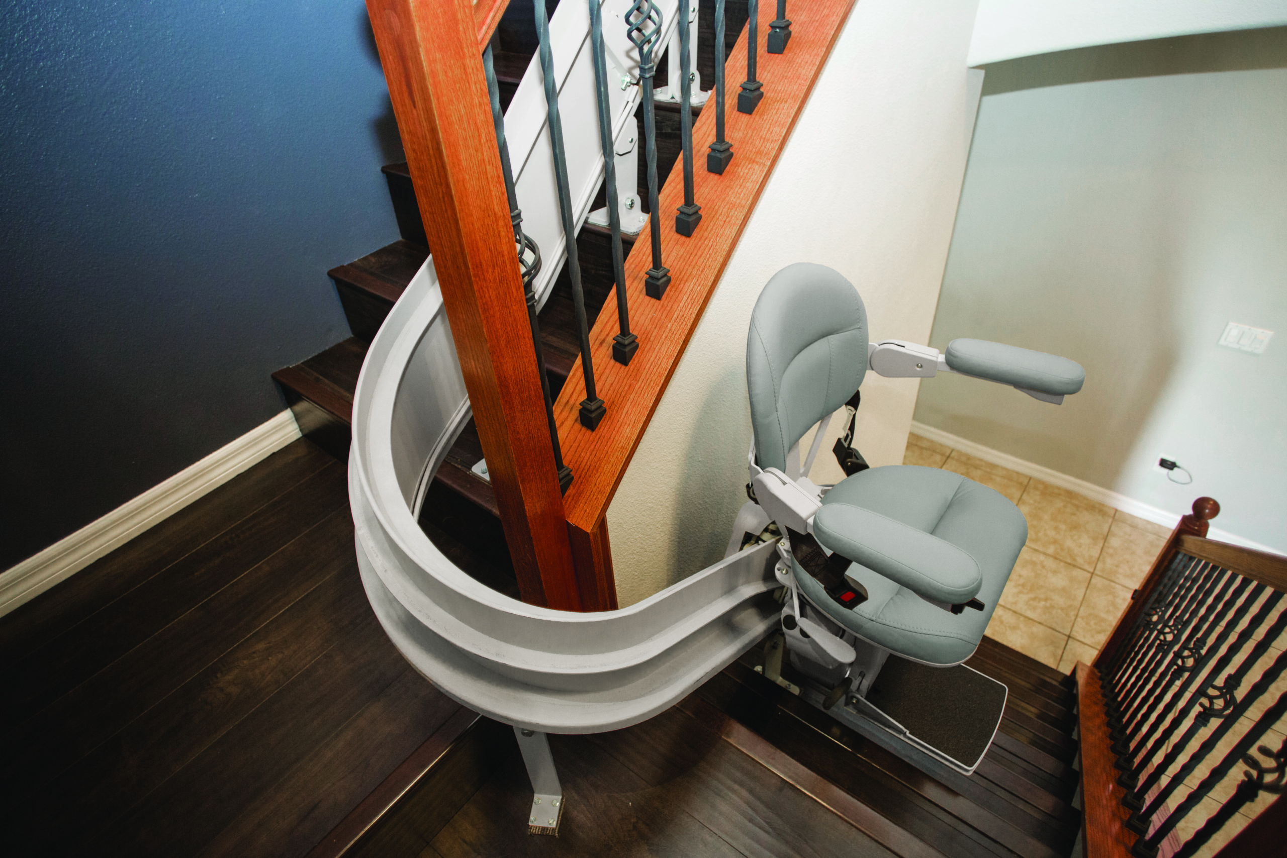 Home Medical Curved Stair Lifts on staircase | Mission Health + Home in Rochester, NY