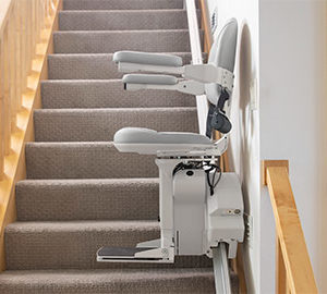 A stair lift, folded out for use.